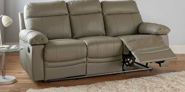 The grey Argos Home Paolo 3-seater manual recliner sofa in a smart lounge setting.